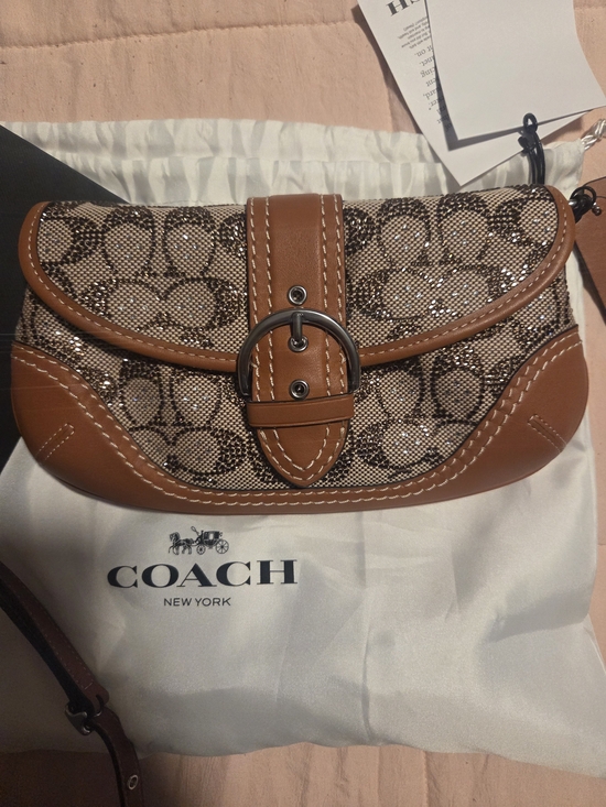 Coach Handbags - Coach Tan Signature Canvas Clutch